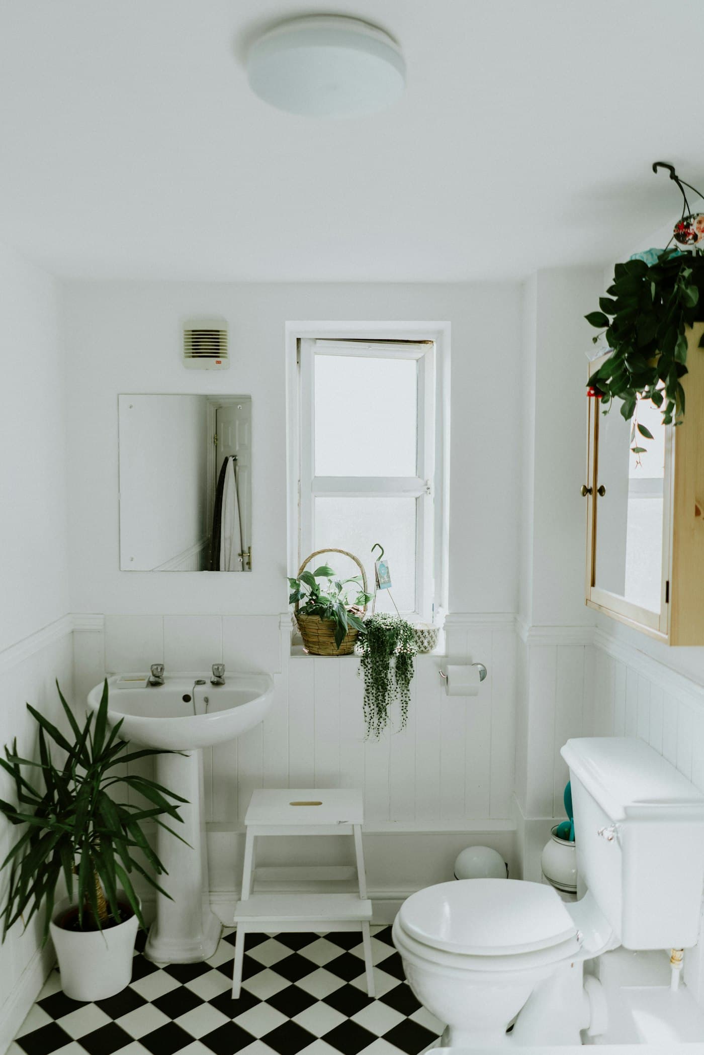Bathroom with toilet and marble-look tiles